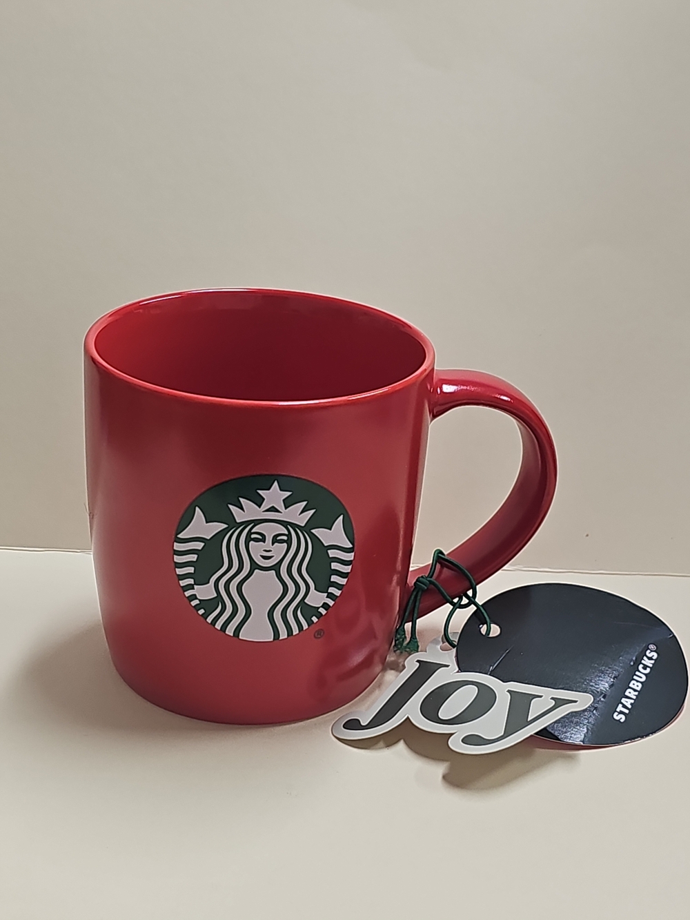 New STARBUCKS 2025 Christmas HOLIDAY Red MUG with gift tag